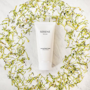 Calming Repair Cream on honeysuckle flowers
